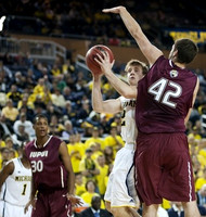 Glenn Robinson III (1) and Spike Albrecht (2)