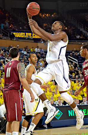 Jon Horford (15) and Glenn Robinson III (1)