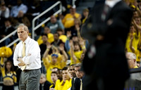 John Beilein, Josh Bartelstein (20), LaVall Jordan, and Jeff Meyer