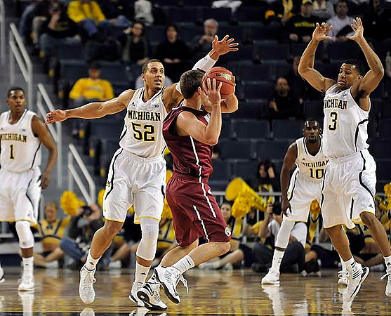 Glenn Robinson III (1), Jordan Morgan (52), Tim Hardaway Jr. (10), and Trey Burke (3)