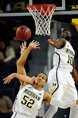 Jordan Morgan (52) and Tim Hardaway Jr. (10)