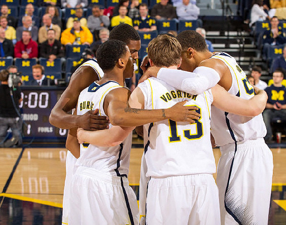 Tim Hardaway Jr. (10), Trey Burke (3), Matt Vogrich (13), and Jordan Morgan (52)