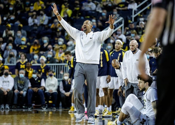 Juwan Howard, Phil Martelli, Brandon Johns Jr. (23), and Terrance Williams II (5)