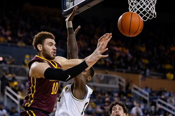 Moussa Diabate (14) and Brandon Johns Jr. (23)