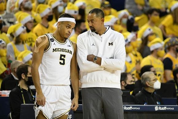 Terrance Williams II (5) and Juwan Howard