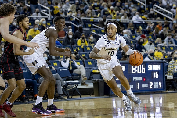 Moussa Diabate (14) and Frankie Collins (10)