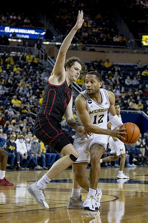 DeVante' Jones (12) and Caleb Houstan (22)