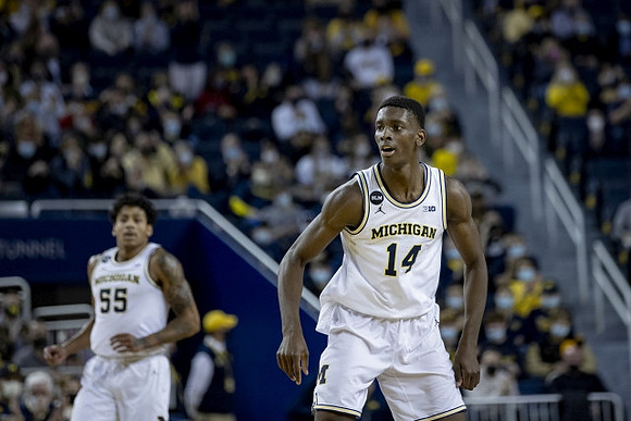 Eli Brooks (55) and Moussa Diabate (14)