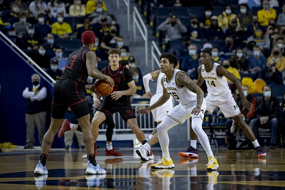Eli Brooks (55) and Moussa Diabate (14)