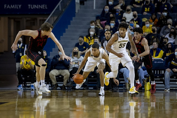 Caleb Houstan (22) and Eli Brooks (55)