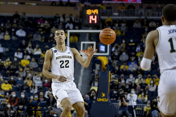 Caleb Houstan (22) and DeVante' Jones (12)