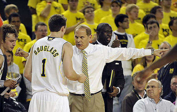 Zack Novak (0), Stu Douglass (1), and John Beilein