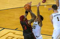 Eli Brooks (55) and Hunter Dickinson (1)