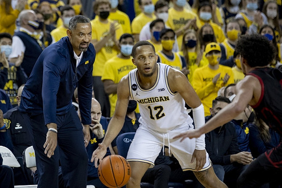 Juwan Howard and DeVante' Jones (12)