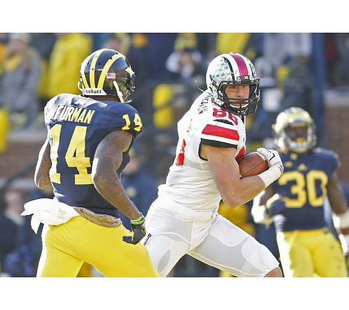 Josh Furman (14) and Thomas Gordon (30)