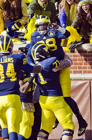 A.J. Williams (84), Ben Braden (71), and Devin Gardner (98)