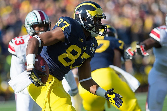 Devin Funchess (87) and Taylor Lewan (77)