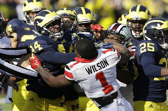 Delano Hill (44) and Dymonte Thomas (25)