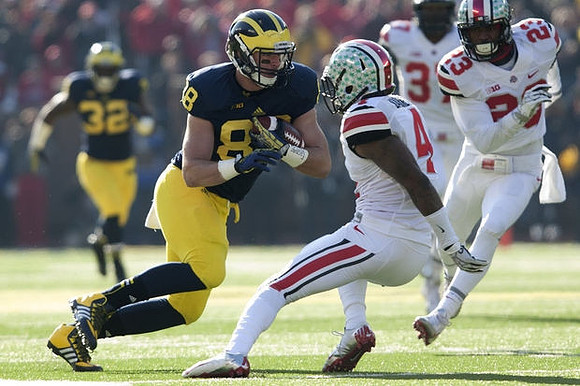 De'Veon Smith (32) and Jake Butt (88)