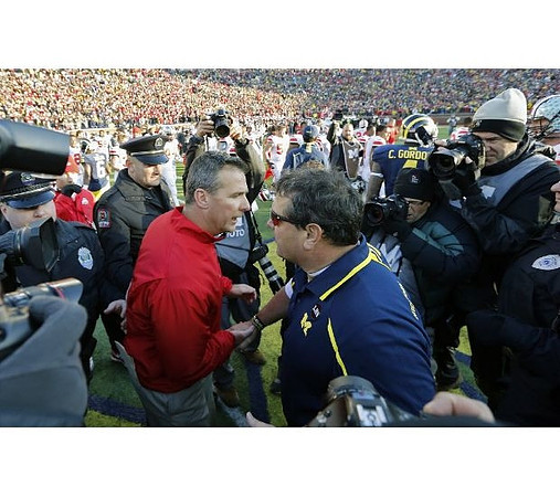 Ohio State Head Coach Urban Meyer and Brady Hoke