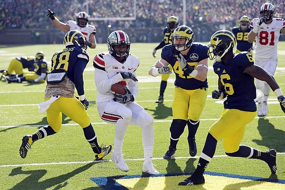 Blake Countess (18), Jake Ryan (47), and Raymon Taylor (6)