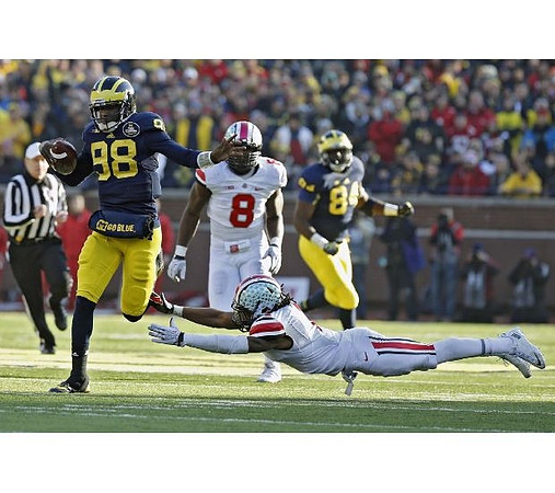 Devin Gardner (98) and A.J. Williams (84)