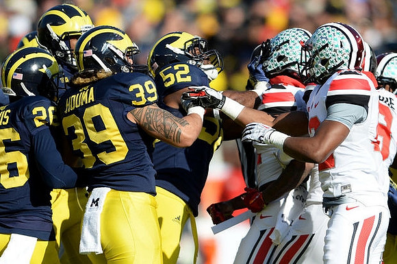 Jourdan Lewis (26), Sione Houma (39), and Royce Jenkins-Stone (52)