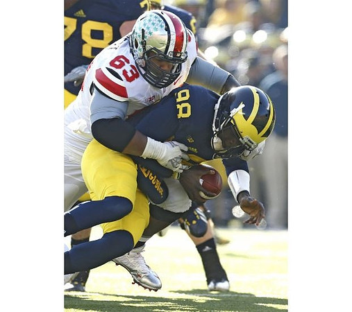Devin Gardner (98) and Erik Magnuson (78)