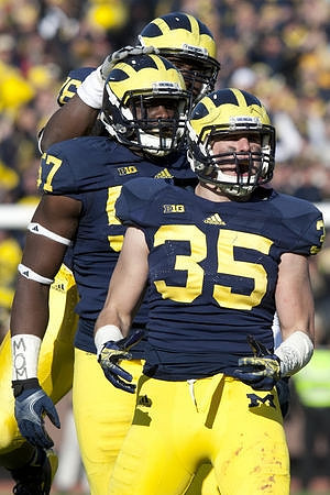 Joe Bolden (35), Frank Clark (57), and Quinton Washington (76)