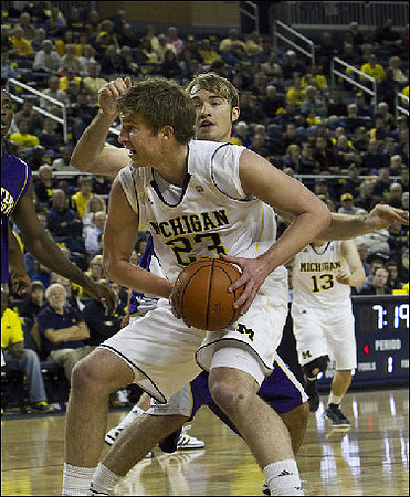 Evan Smotrycz (23) and Matt Vogrich (13)