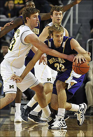 Evan Smotrycz (23) and Zack Novak (0)