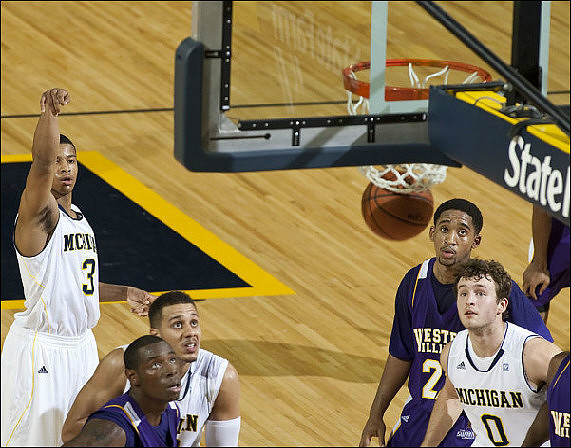Trey Burke (3), Jordan Morgan (52), and Zack Novak (0)
