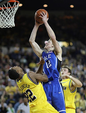 Jevohn Shepherd (22) and Zack Novak (0)