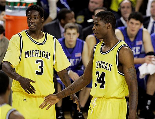 Manny Harris (3) and DeShawn Sims (34)