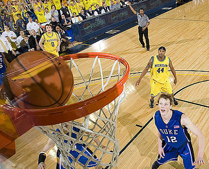 Zack Novak (0) and Kelvin Grady (44)
