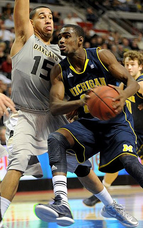 Tim Hardaway Jr. (10) and Zack Novak (0)