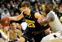 Evan Smotrycz (23) and Laval Lucas-Perry (13)