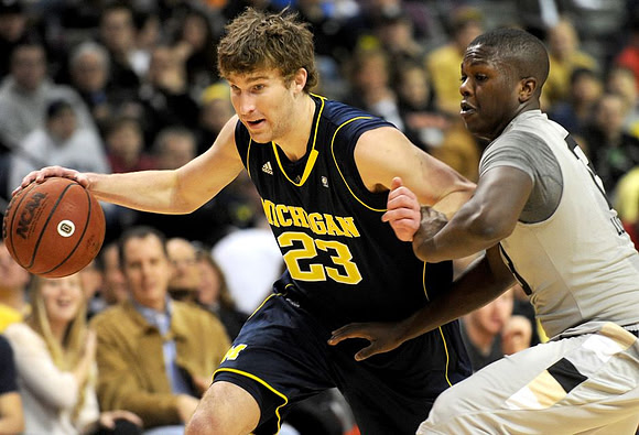 Evan Smotrycz (23) and Laval Lucas-Perry (13)