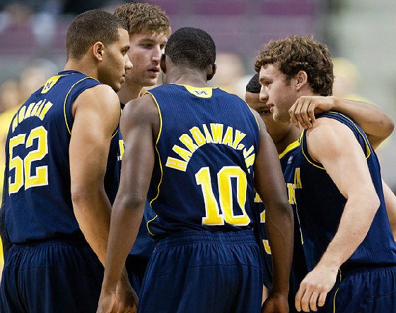 Jordan Morgan (52), Evan Smotrycz (23), Tim Hardaway Jr. (10), Zack Novak (0), and Trey Burke (3)