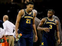 Zak Irvin (21) and Xavier Simpson (3)