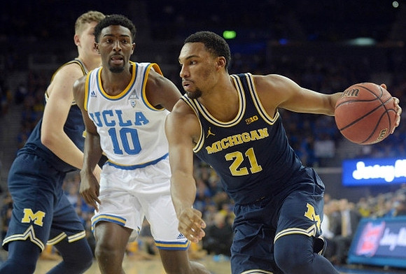 Moritz Wagner (13) and Zak Irvin (21)