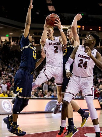 Muhammad-Ali Abdur-Rahkman (12) and Moritz Wagner (13)