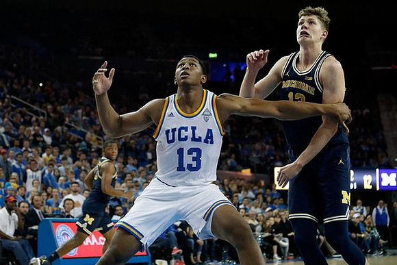 Xavier Simpson (3) and Moritz Wagner (13)