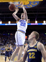Derrick Walton Jr. (10) and Duncan Robinson (22)