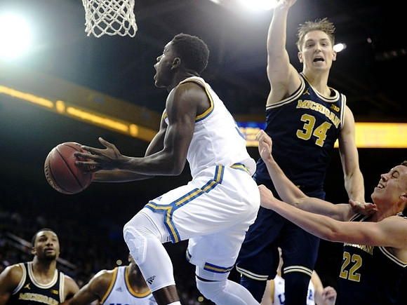 Zak Irvin (21), Mark Donnal (34), and Duncan Robinson (22)