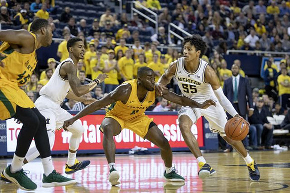 Charles Matthews (1) and Eli Brooks (55)