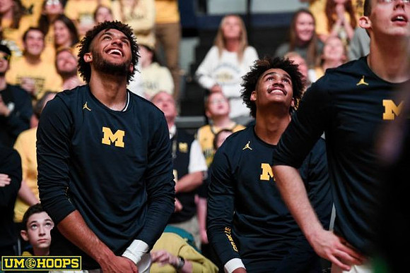 Isaiah Livers (4) and Jordan Poole (2)