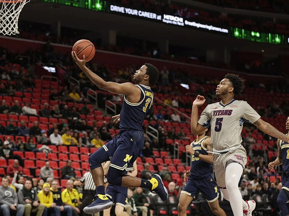 Zavier Simpson (3) and Ibi Watson (23)