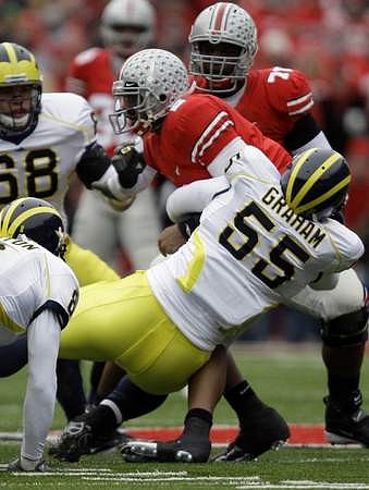 Brandon Graham (55), Jonas Mouton (8), and Mike Martin (68)
