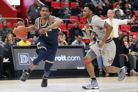 Charles Matthews (1) and John Beilein